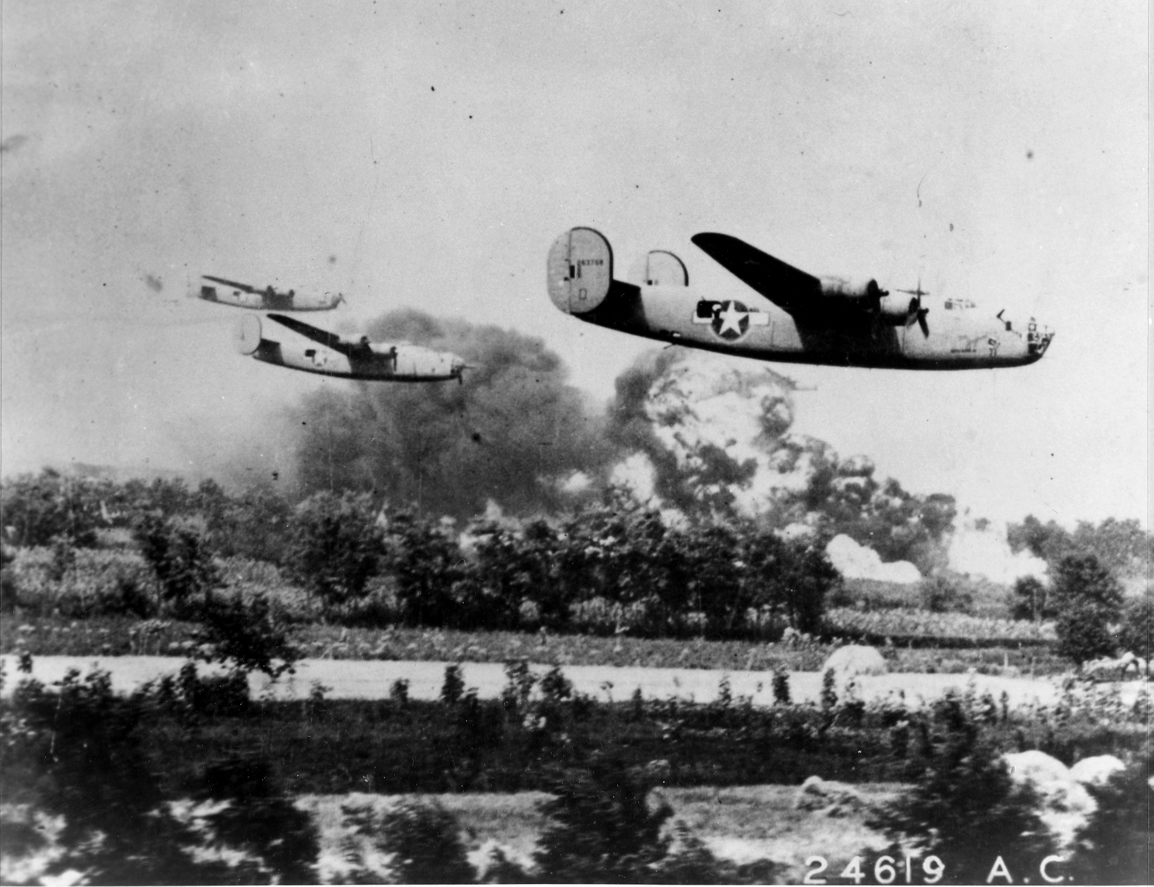 B-24s at treetop level as they pass through the target area during the Ploesti Raid. (U.S. Air Force)
